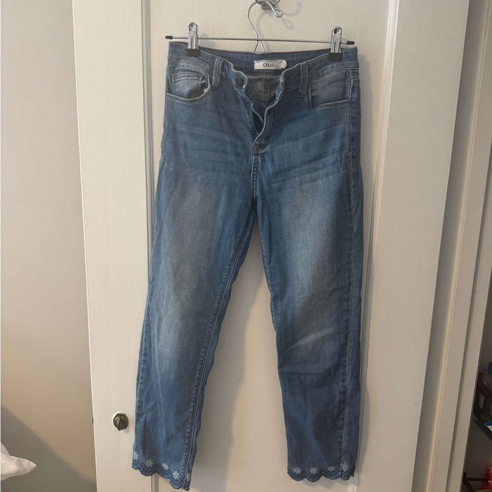 Denim Blue Jeans w/ cute embroidered flowers at the bottom